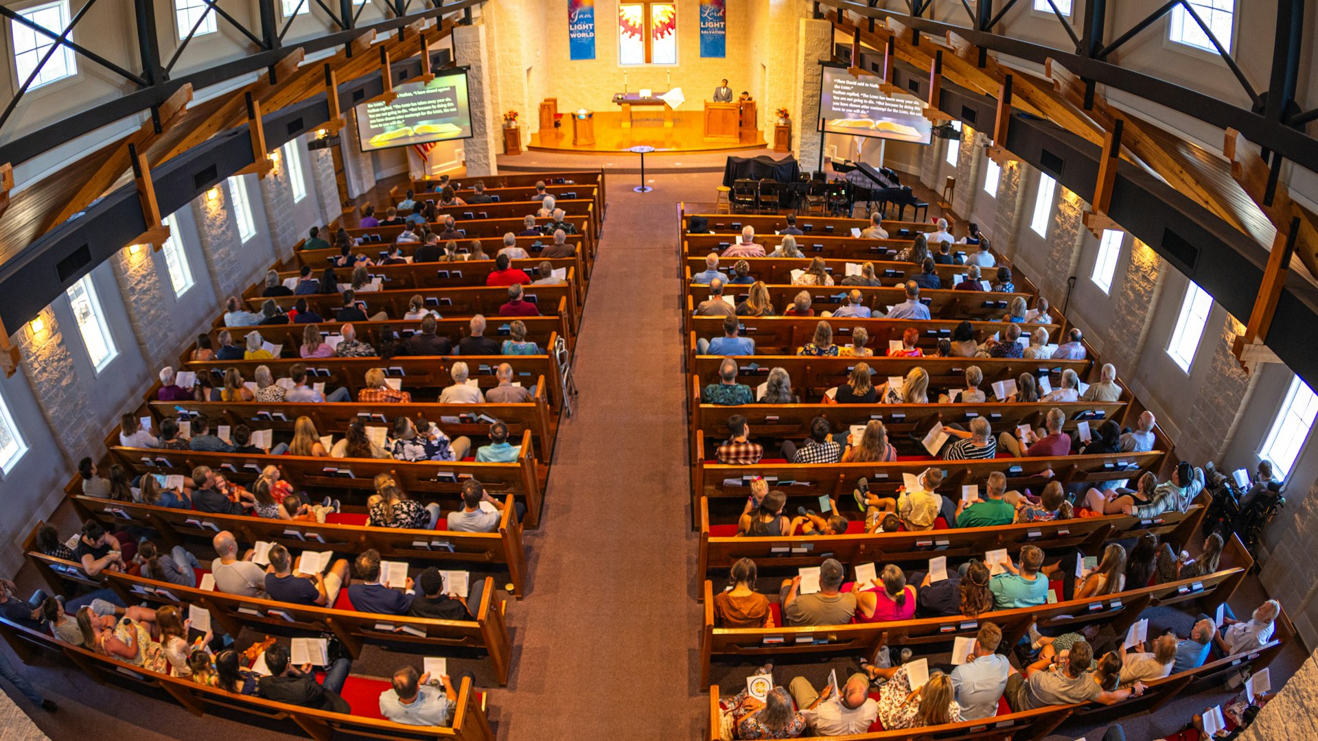 Church congregation seated in pews during worship service