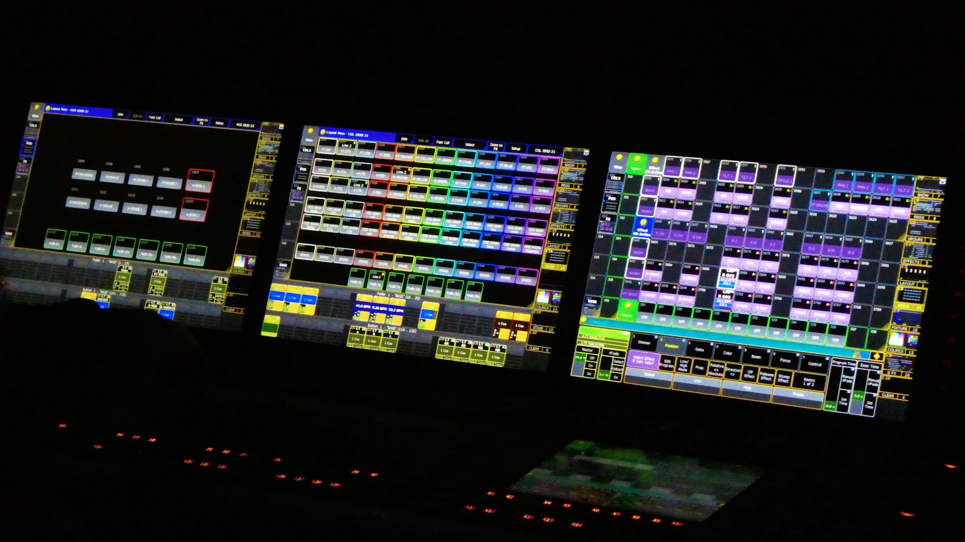 Stage lighting control console with colorful buttons