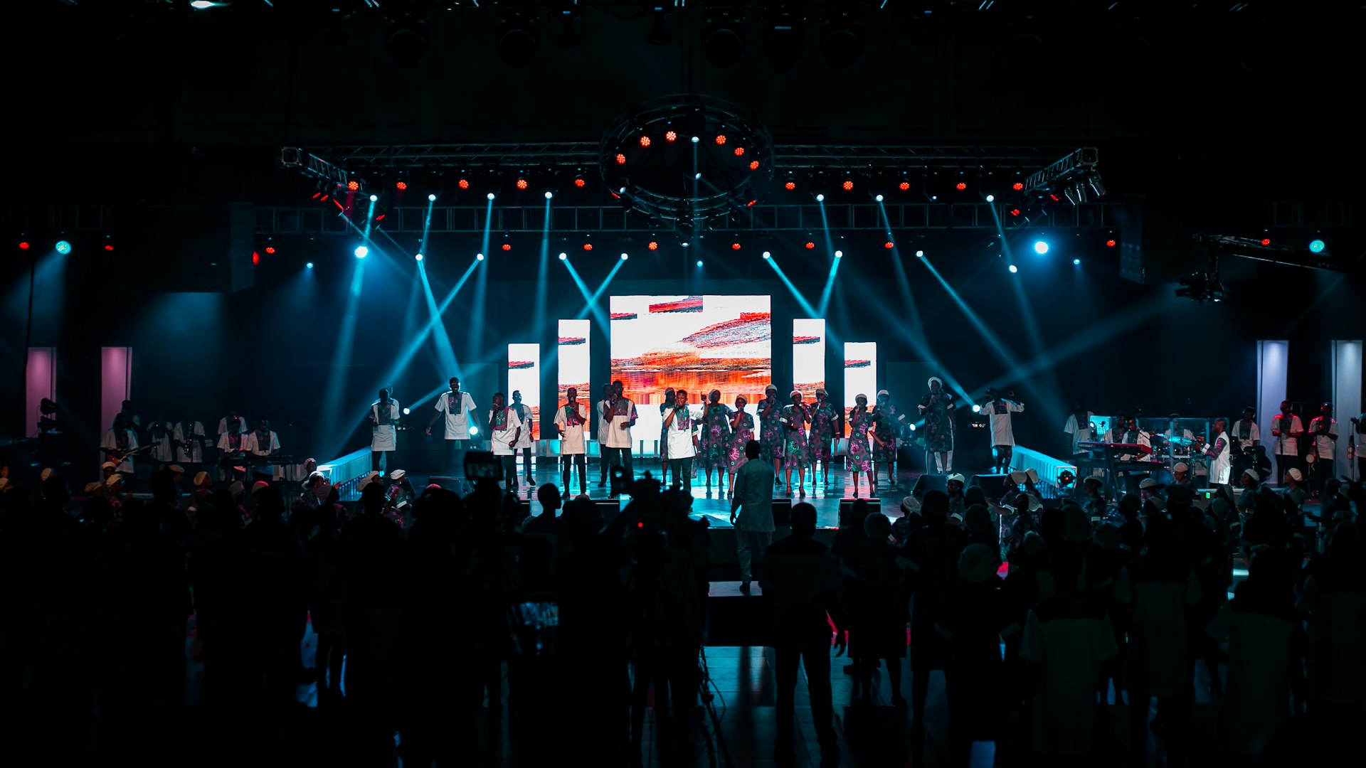 Worship stage lit with stage lighting during an evening service