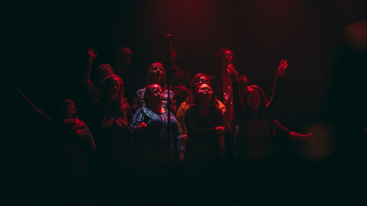 Worship team singing on stage
